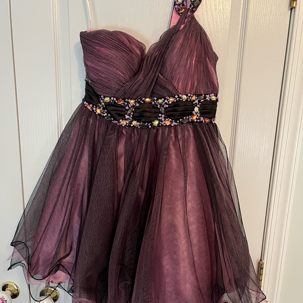 Elegant Homecoming or Party Dress in Purple and has embellished waist.